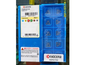 Kyocera tungsten carbide insert CNMG120404GP CA5505