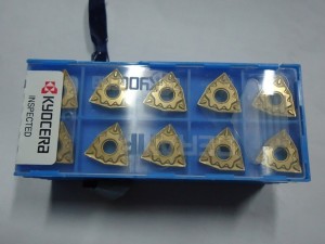 Kyocera tungsten carbide insert CNMG120404GP CA515